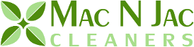 Logo for Mac N Jac Cleaners, featuring four green leaves arranged in an X shape to the left of the business name in green and light green text on a white background.